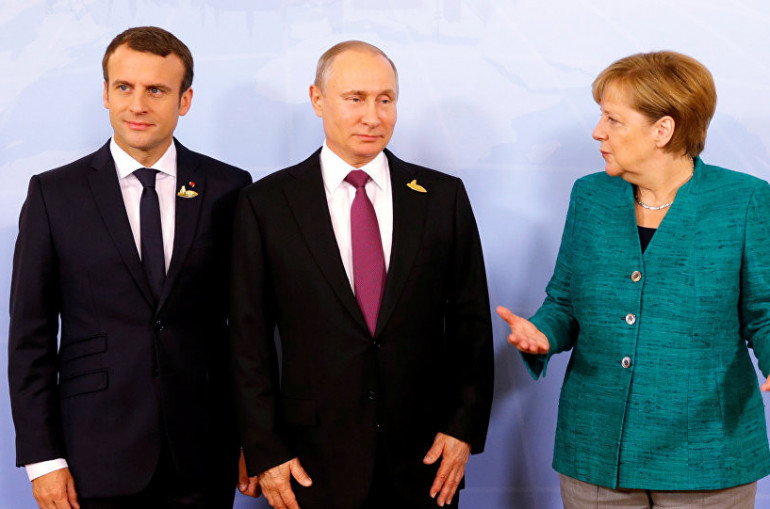 Merklova, Putin in Macron so se pogovarjali o ruskem cepivu